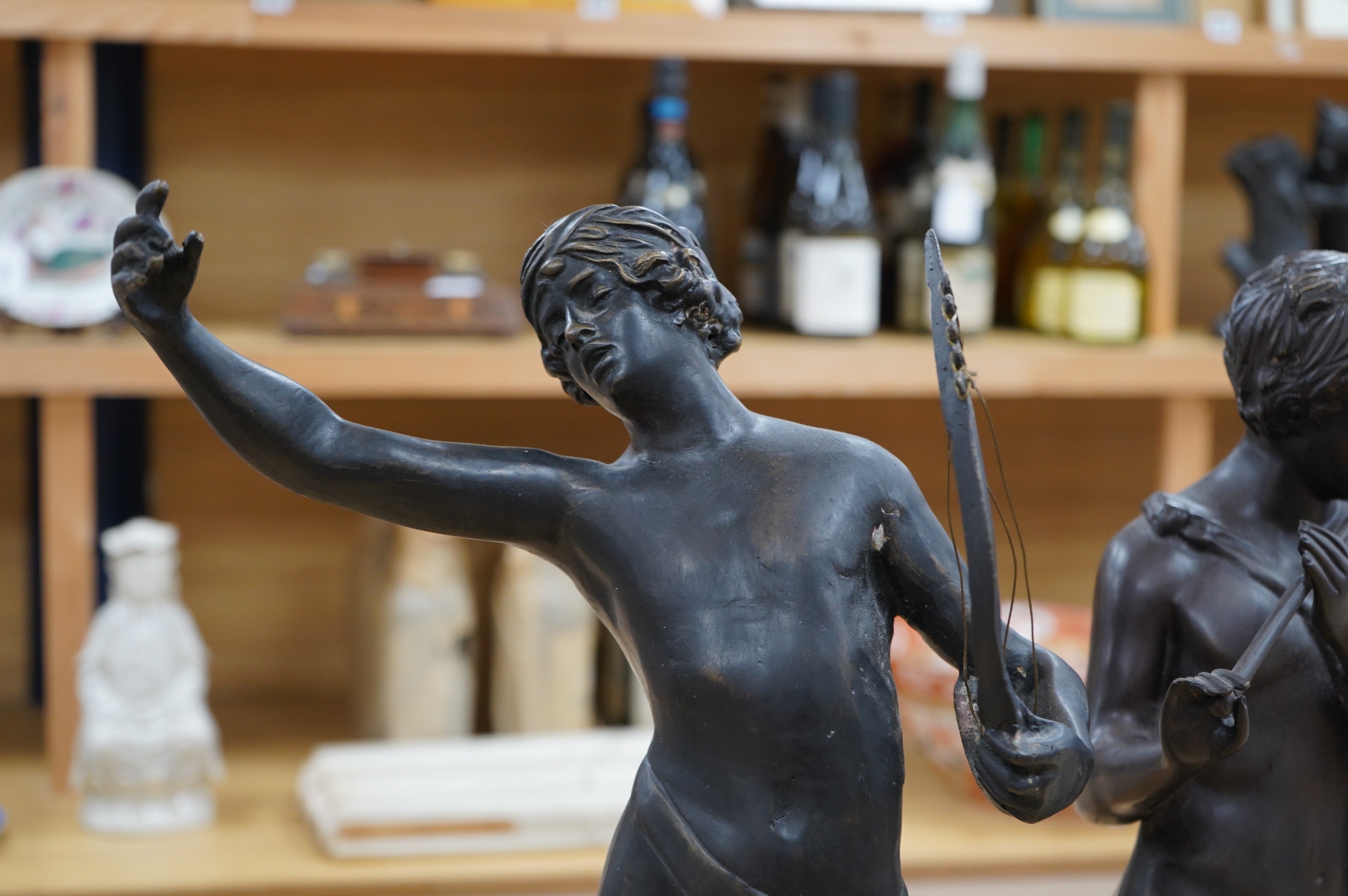 After the Antique, two spelter figures including a faun, largest 66cm high. Condition - fair